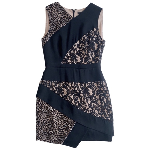 BCBGMaxAzria Dresses & Skirts - BCBGMAXAZRIA Asymmetrical Black Lace Mini Dress. Item# 0073